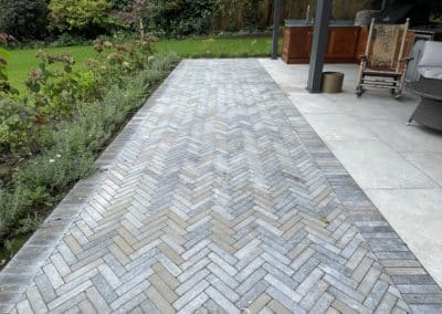 Limestone pavers adding texture to the paving.