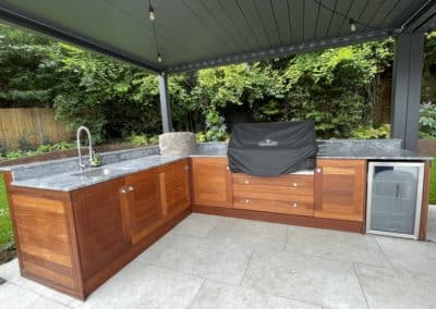 Meranti wood added to the warmth of the outdoor kitchen making the area an inviting space to entertain in.