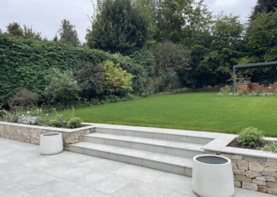 The open space and mature planting as well as new planting adds to the serene feel of the garden design.