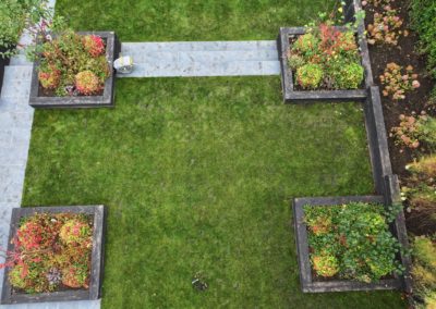 Autumn colour being shown in the plant design of this symmetrical garden.